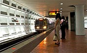 A Metro train approaches the platform